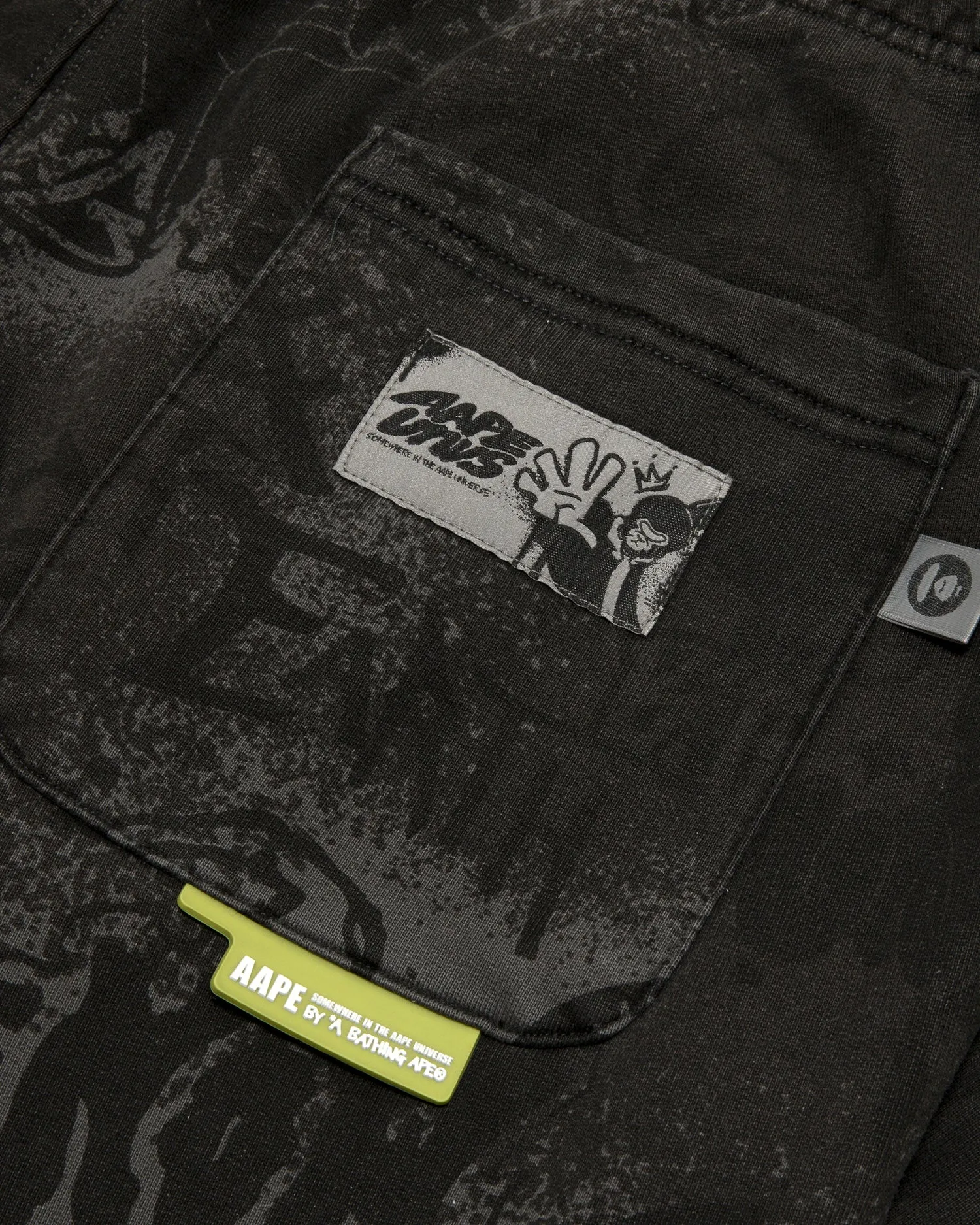 AAPEUNVS graffiti print sweat pants