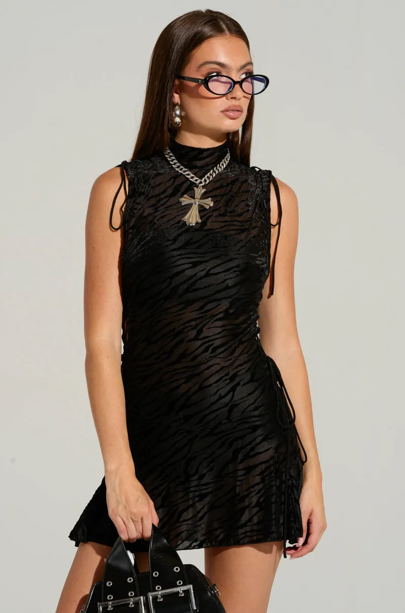 BACK OUTSIDE ZEBRA PRINT MINI DRESS