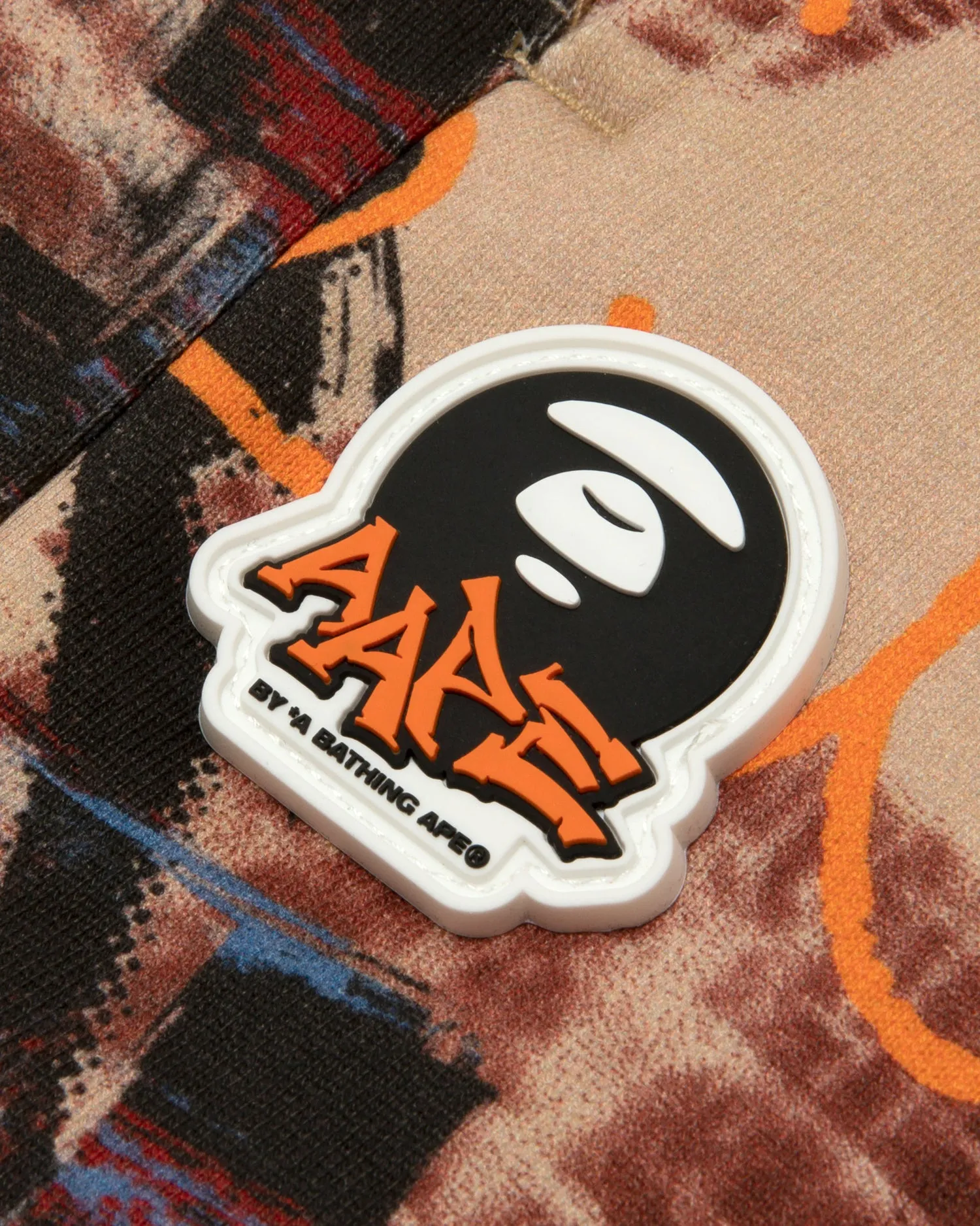Moonface logo graffiti print jogger pants
