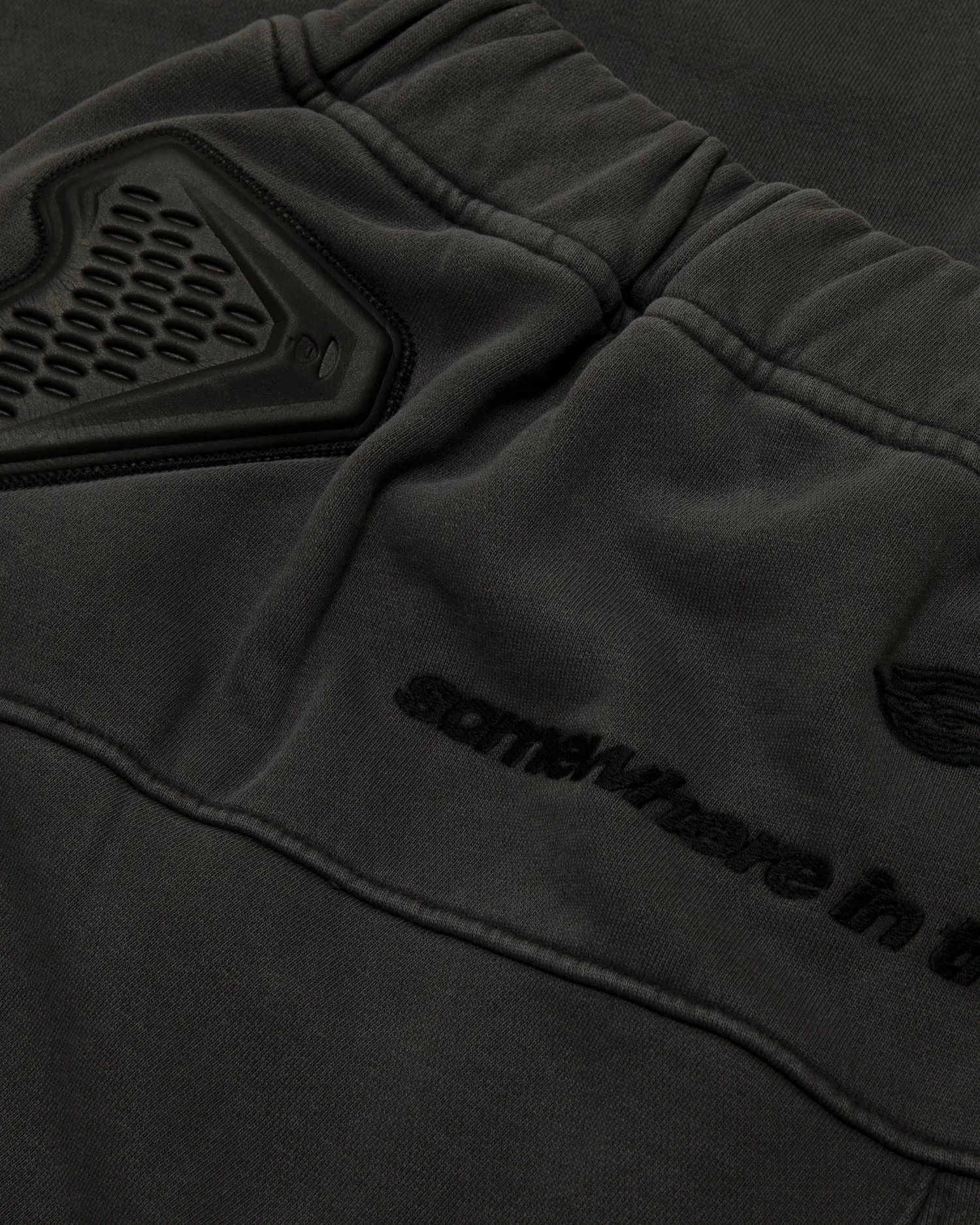 Moonface logo patch sweat pants